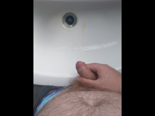 Slow motion sink pissing from a bear