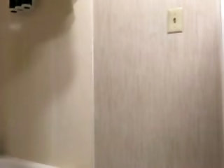 jack off in hotel bathroom