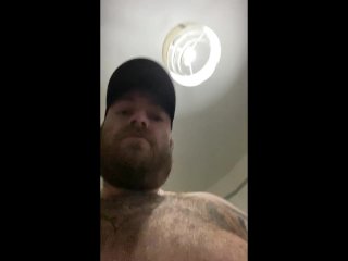 Builder Danny Wyatt takes a smoke break showing off his big belly