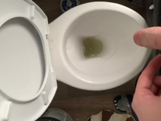 Just simple pissing in a dirty hostels toilet and flushing my piss down