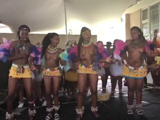 Busty Zulu girls dancing topless at a ceremony