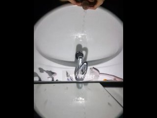 Messy pissing into the sink