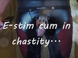 Estim cum load in chastity