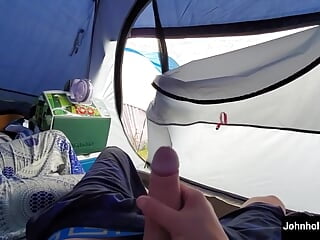 johnholmesjunior shooting huge cum load with open tent door slow motion