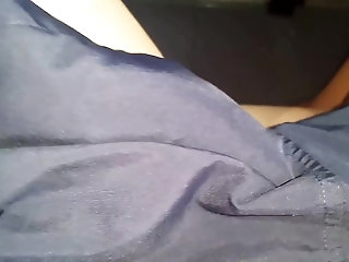 shaking bulge of blue shorts on bus