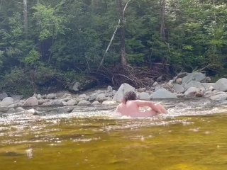 Nikkii Layne taking a dip in the stream