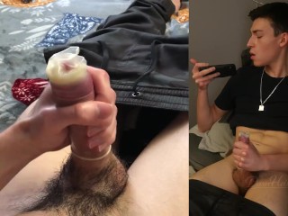 HUNG TWINK JACKS OFF IN CONDOM