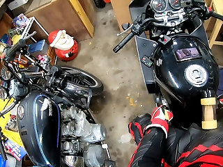 leather biker milked on his motorcycle